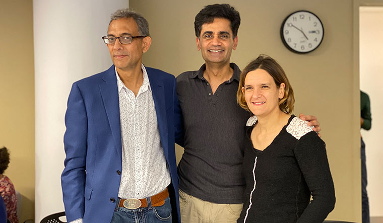 44-Dhaliwal-with-Banerjee-and-Duflo