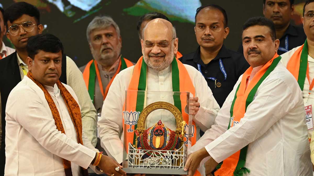 Union Home Minister Amit Shah being felicitated by Sukanta Majumder (left) and Suvendu Adhikari during a party meeting in Kolkata | Salil Bera Union Home Minister Amit Shah being felicitated by Sukanta Majumder (left) and Suvendu Adhikari during a party meeting in Kolkata | Salil Bera
